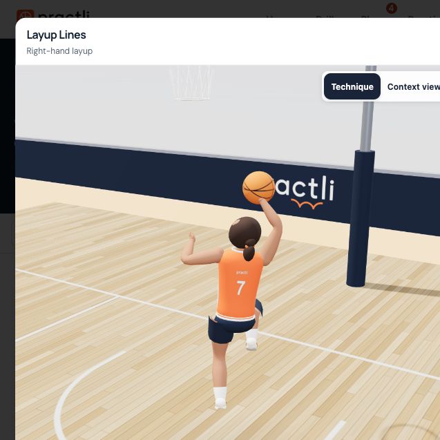 Youth player lifting the right knee and shooting hand for a layup